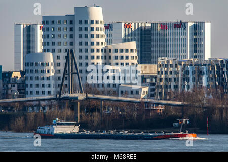 Düsseldorf, Germany, the Gehry buildings, Neuer Zollhof, in the Medienhafen, Media port district,  behind the RWI4 building complex, river Rhine, carg Stock Photo