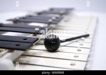 An old musical instrument on a white background Stock Photo