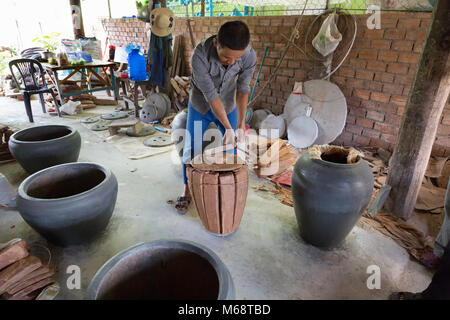 Cambodia craftman making clay water pots ; Angkor Borei, Cambodia Asia Stock Photo