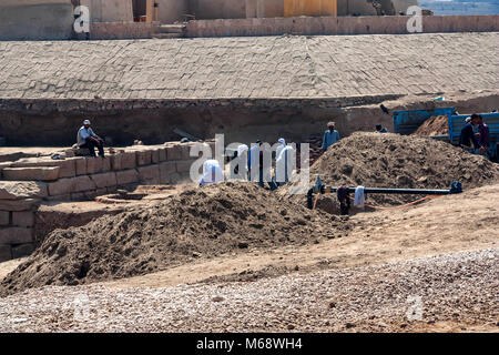 LUXOR, EGYPT - FEBRUARY 17, 2010: Workers at excavation site in Luxor, Egypt Stock Photo