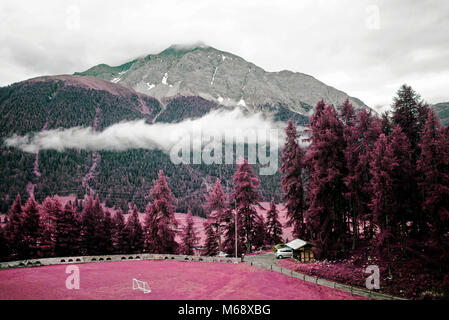 Beautiful landscape and mountains in the alps switzerland in color infrared Stock Photo