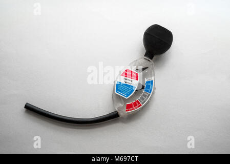 Battery tester or hydrometer for testing the specific gravity or electrolytes of automobile batteries. Stock Photo