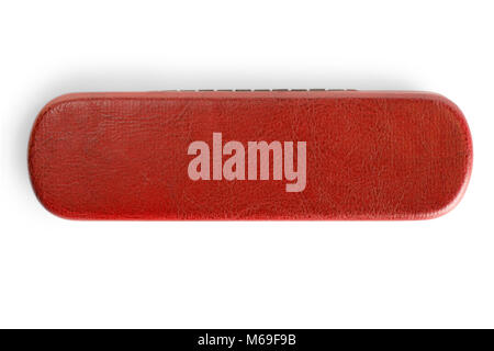 Small closed long red leather case close up. Isolated on white, clipping path included Stock Photo