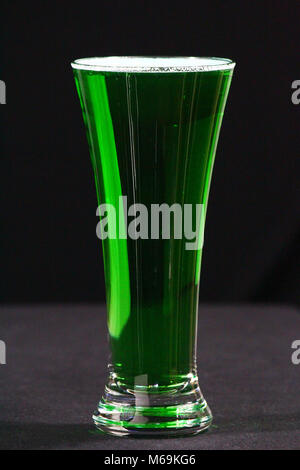 Green beer in a pilsner glass Stock Photo