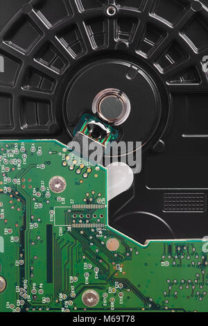 Hard drive disc detail with mother board. Backup device. Vertical Stock Photo