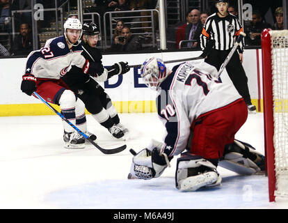 Los Angeles, California, USA. 1st Mar, 2018. Columbus Blue Jackets' goalie Joonas Korpisalo (70) makes save on a shot by Los Angeles Kings' forward Dustin Brown (23) during a 2017-2018 NHL hockey game in Los Angeles on March 1, 2018. Los Angeles Kings won 5-2. Credit: Ringo Chiu/ZUMA Wire/Alamy Live News Stock Photo