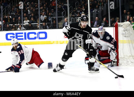 Los Angeles, California, USA. 1st Mar, 2018. Los Angeles Kings' forward Tanner Pearson (70) controls the puck against Columbus Blue Jackets' defenseman David Savard (58) and Columbus Blue Jackets' goalie Joonas Korpisalo (70) during a 2017-2018 NHL hockey game in Los Angeles on March 1, 2018. Los Angeles Kings won 5-2. Credit: Ringo Chiu/ZUMA Wire/Alamy Live News Stock Photo