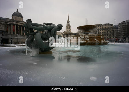 Trafalgar Square, London. 1st Mar, 2018. UK Weather: The famous fountains in London's Trafalgar Square now have icicles thanks to the 'Beast from the East' Credit: Edward Webb/Alamy Live News