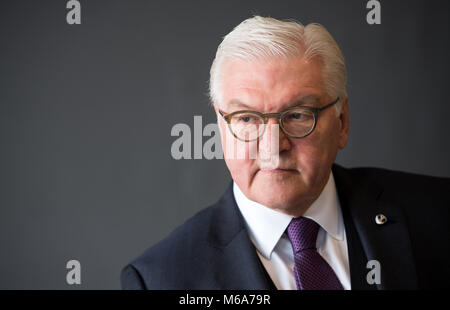 02 March 2018, Portugal, Porto: German President Frank-Walter Steinmeier listes to a student at the Science and Technology Park of the University of Porto. German President Steinmeier is in Portugal for a two-day visit. Photo: Bernd von Jutrczenka/dpa Stock Photo