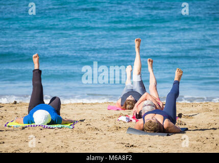 Pensioners daily keep fit class on beach in Spain Stock Photo