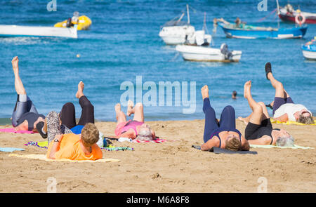 Pensioners daily keep fit class on beach in Spain Stock Photo