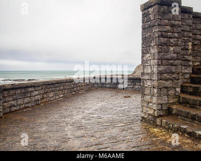 Brick terrace on the Itzurun Beach in Zumaia, Basque Country, Spain Stock Photo