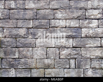 Real medieval gray brickwall masonry background Stock Photo