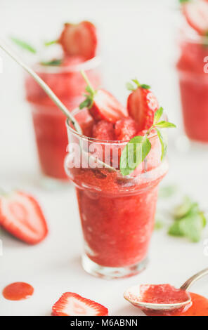 Strawberry and champaigne summer granita in glasses with mint leaves Stock Photo