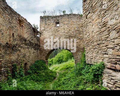Entrance to the Saschiz fortress in Transylvania Stock Photo