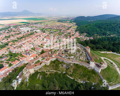 The Saxon fortress Rasnov near Brasov in Transylvania Romania. Aerial photo with a drone Stock Photo