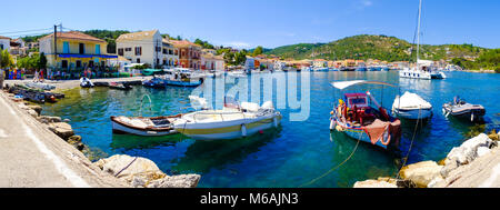 Paxos island panorama in the old harbour. Important touristic attraction for daily boat trips near the island of Corfu, Greece Stock Photo