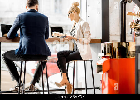 Business couple in the cafe Stock Photo