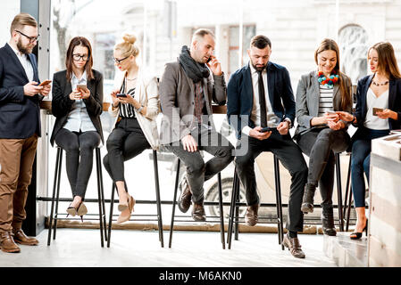 Business people sitting near the window Stock Photo