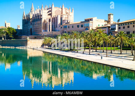 La Seu - the famous medieval gothic catholic cathedral. Palma de Mallorca, Spain. Water reflection. Stock Photo