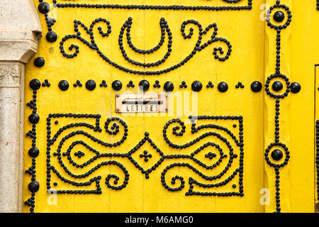 TUNIS, TUNISIA, MAY 2012: Traditional Tunisian door in Tunis, the capital of the islamic country. Stock Photo