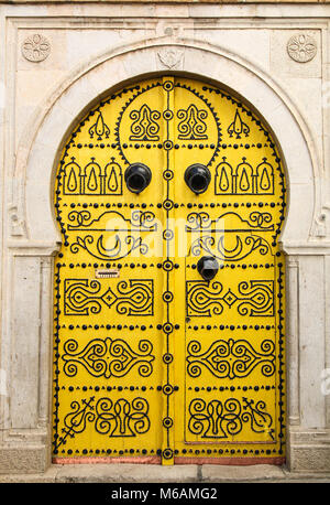 TUNIS, TUNISIA, MAY 2012: Traditional Tunisian door in Tunis, the capital of the islamic country. Stock Photo