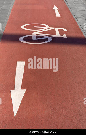 Marked cycle path on red asphalt, Bavaria, Germany Stock Photo