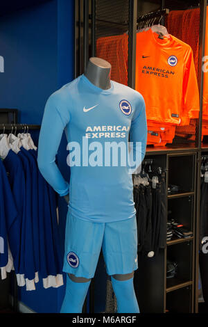 photos of the display of football kit and merchandise in the club shop of Brighton and Hove Albion football team Stock Photo