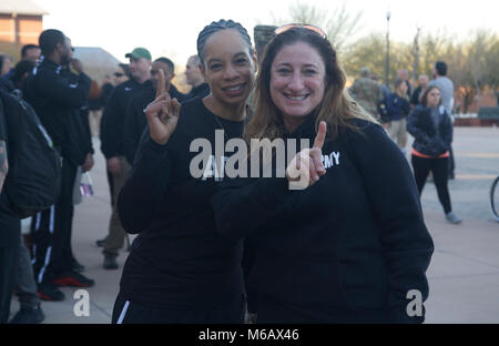 U.S. Army Staff Sgt. Altermese Kendrick (left) assigned to U.S. Army Garrison, Fort Hood, Texas and Sgt. 1st Class Heather Moran assigned to 364th Expeditionary Sustainment Command pose for the camera during an opening ceremony at Fort Bliss, Texas, Feb. 26, 2018. 74 wounded, ill, or injured active duty Soldiers and veterans participate in a series of events that are held at Fort Bliss, Texas, Feb. 27 through March 9 2018, as Deputy Chief of Staff, Warrior Care and Transition hosts the 2018 U.S. Army Trials. (U.S. Army Stock Photo