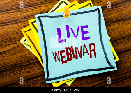Writing text showing Live Webinar. Business concept for Business Web E-learning written on sticky note paper on wooden background. Stock Photo