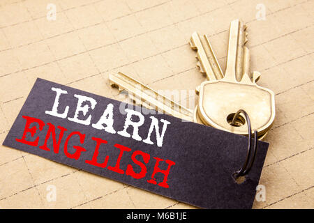 Conceptual hand writing text caption showing Learn English. Business concept for Language School written on note paper attached to keys note paper on  Stock Photo