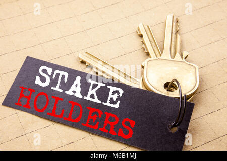 Conceptual hand writing text caption showing Stake Holders. Business concept for Stakeholder Engagement written on note paper attached to keys note pa Stock Photo