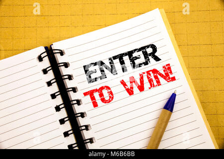 Enter to Win. Business concept for Winning in Competition written on notepad with space on old wood wooden background with pen marker Stock Photo