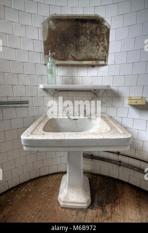 Dirty bathroom in an abandoned house Stock Photo