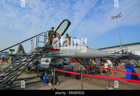 Singapore  - Feb 10, 2018. People visit cabin of Lockheed Martin F-16 Fighting Falcon aircraft belong to the Singapore Air Force at the 2018 Singapore Stock Photo