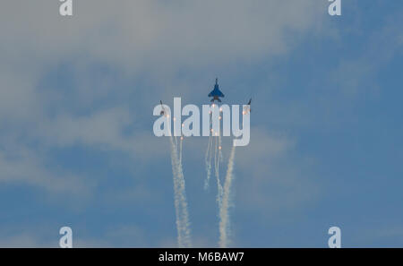 Singapore  - Feb 10, 2018. Aircrafts from the Republic of Singapore Air Force aerobatic display team fly in formation during the 2018 Singapore Airsho Stock Photo