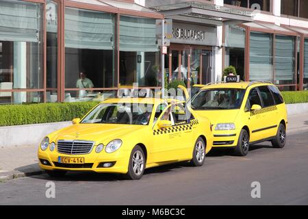 BUDAPEST, HUNGARY - JUNE 19, 2014: Taxi drivers wait in Budapest. There are some 5,300 taxi cabs in Budapest. Stock Photo