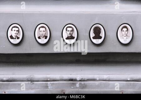 BUDAPEST, HUNGARY - JUNE 19, 2014: Photos of victims of fascist and communist regimes outside House of Terror, Budapest. 3,000 civilians were killed i Stock Photo