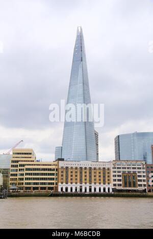 LONDON, UK - APRIL 22, 2016: Shard skyscraper in London, UK. The 309m tall building is the tallest in the European Union. Stock Photo