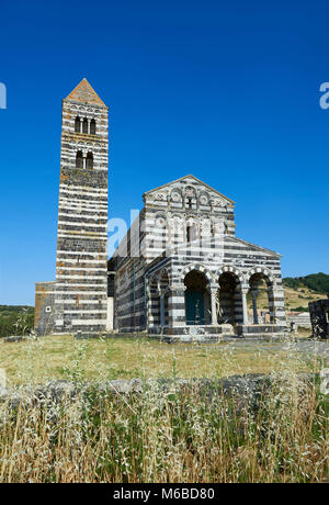 Picture and image of the exterior of the Tuscan Romanesque Pisan style basilica of Santissima Trinita di Saccargia, consecrated 1116, Codrongianos, Sa Stock Photo