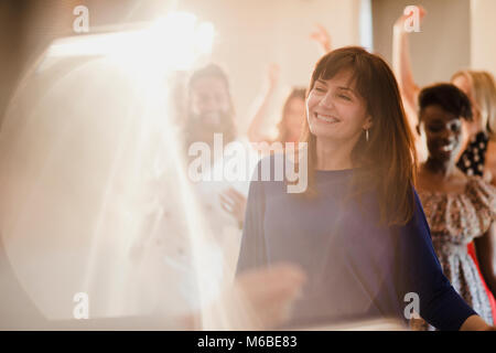Mother of bride is dancing with other wedding guests. Stock Photo