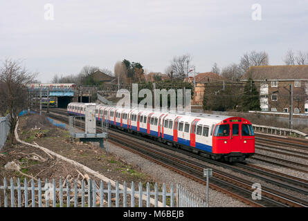A Bakerloo Line London Underground train formed of 1972 stock passing South Kenton in west London on the 13th March 2006.   A Bakerloo Line London Und Stock Photo