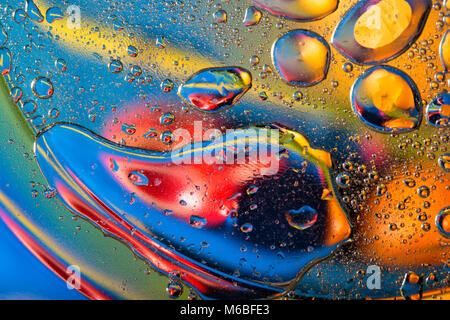 Abstract background with big and small oily drops Stock Photo