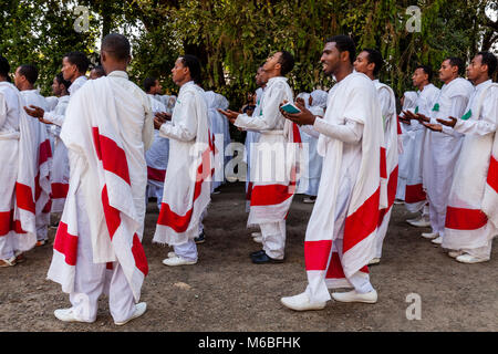 Ethiopian Orthodox Christians Dressed In Traditional White Celebrate Timkat (Epiphany) At Kidist Mariam Church, Addis Ababa, Ethiopia Stock Photo