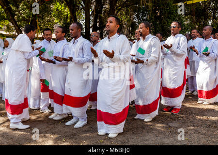 Ethiopian Orthodox Christians Dressed In Traditional White Celebrate Timkat (Epiphany) At Kidist Mariam Church, Addis Ababa, Ethiopia Stock Photo