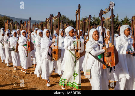 A Procession Of Female Ethiopian Christians Carrying Begenas Arrive At The Jan Meda Sportsgound To Celebrate Timkat (Epiphany), Addis Ababa, Ethiopia Stock Photo