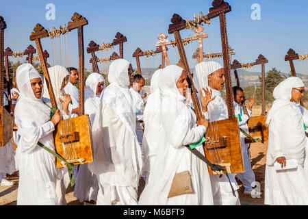 A Procession Of Female Ethiopian Christians Carrying Begenas Arrive At The Jan Meda Sportsgound To Celebrate Timkat (Epiphany), Addis Ababa, Ethiopia Stock Photo