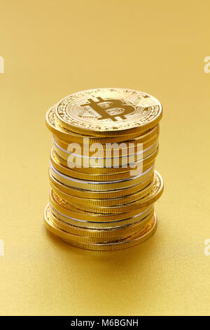 Litecoin and virtual money concept. Gold bitcoins with chart of growing ...