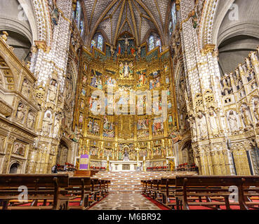 TOLEDO, SPAIN - MARCH 17, 2015: The Main altar in the interior of the Cathedral of Saint Mary in Toledo, a Roman Catholic 13th-century High Gothic cathedral and a UNESCO World Heritage Site. Stock Photo