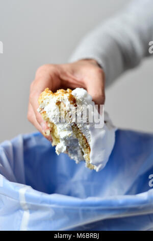Young man with piece of birthday cake on beige background Stock Photo ...